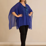 Κομψή τουνίκαμε λεπτομέρειες από παγιέτες σε άνετη γραμμή – Μπλε ρουά