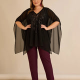 Κομψή τουνίκαμε λεπτομέρειες από παγιέτες σε άνετη γραμμή – Μαύρο