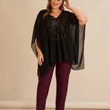 Κομψή τουνίκαμε λεπτομέρειες από παγιέτες σε άνετη γραμμή – Μαύρο