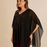 Κομψή τουνίκαμε λεπτομέρειες από παγιέτες σε άνετη γραμμή – Μαύρο